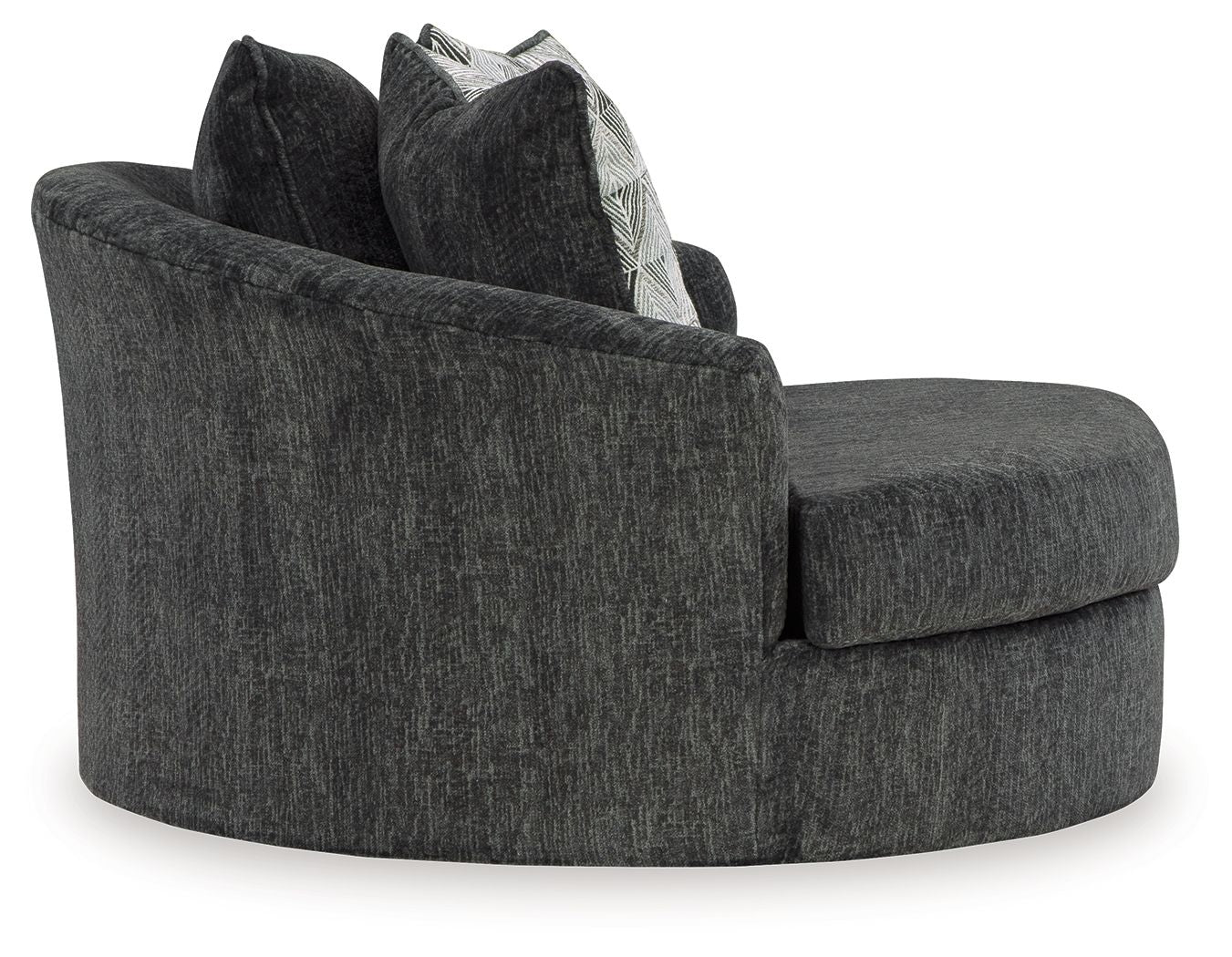 Dark gray oversized swivel accent chair with armrests and two stacked geometric pillows