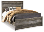Gray wood panel bed with tall headboard and low footboard, with bedding
