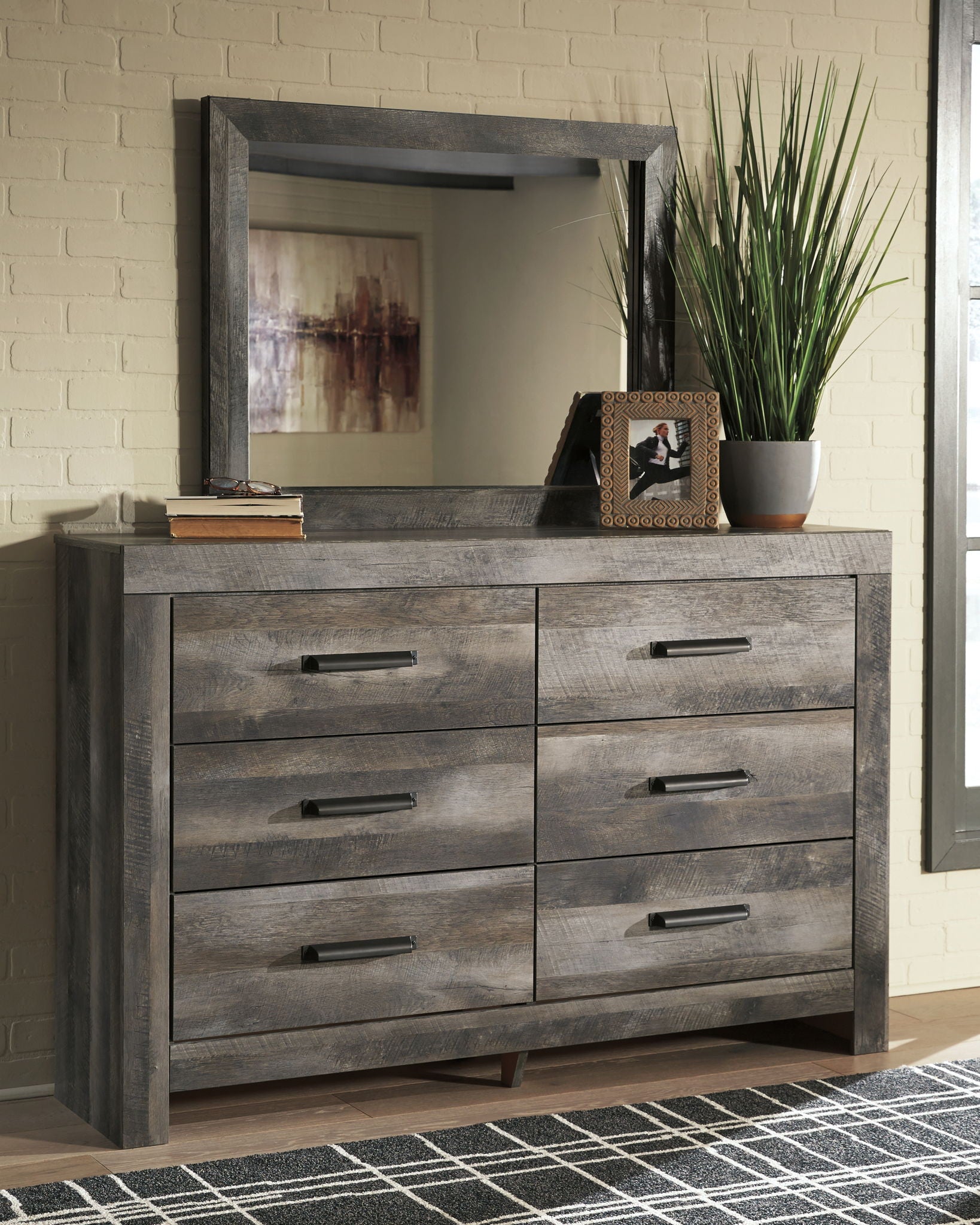 Gray dresser with mirror and six drawers, black bar pulls