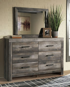 Gray wood dresser with four drawers and wall mirror with gray frame
