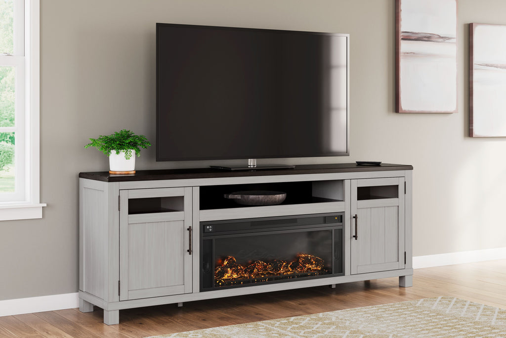Gray TV stand with electric fireplace insert, open center shelf, and two side doors
