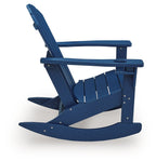 Blue wooden rocking chair with slatted back and curved rockers, angled view