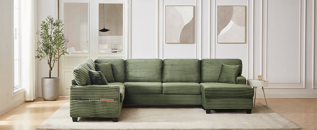 Green corduroy sectional sofa with one movable ottoman piece and padded armrests