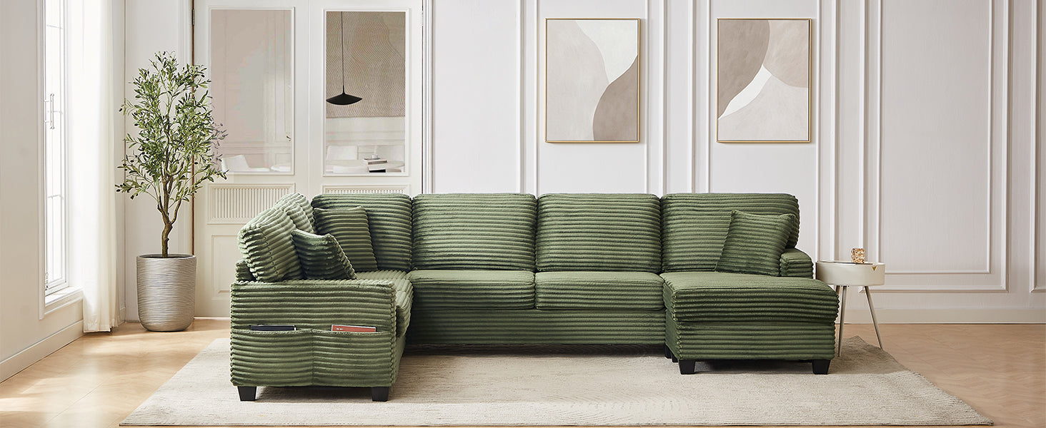 Green corduroy sectional sofa with one movable ottoman piece and padded armrests