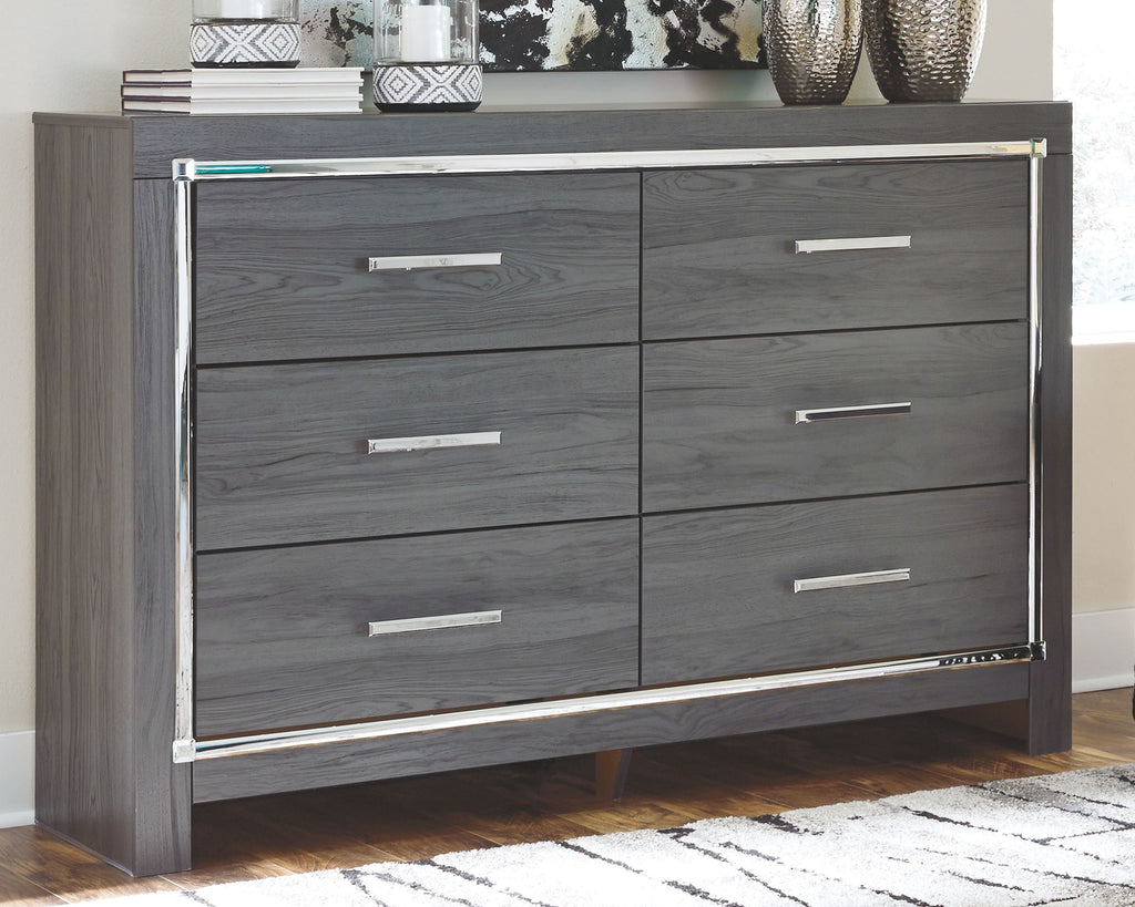Gray dresser with six drawers and metal pulls