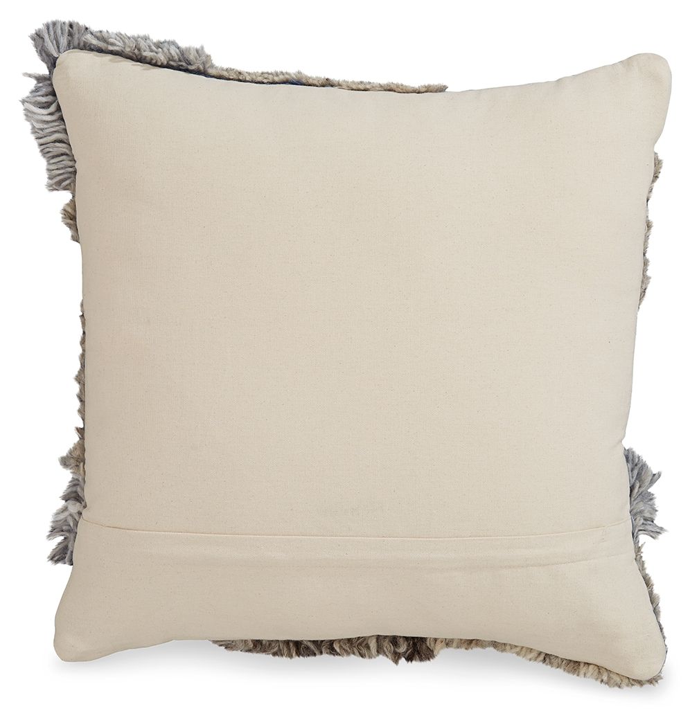 Cream throw pillow with gray fringed edges and smooth front panel