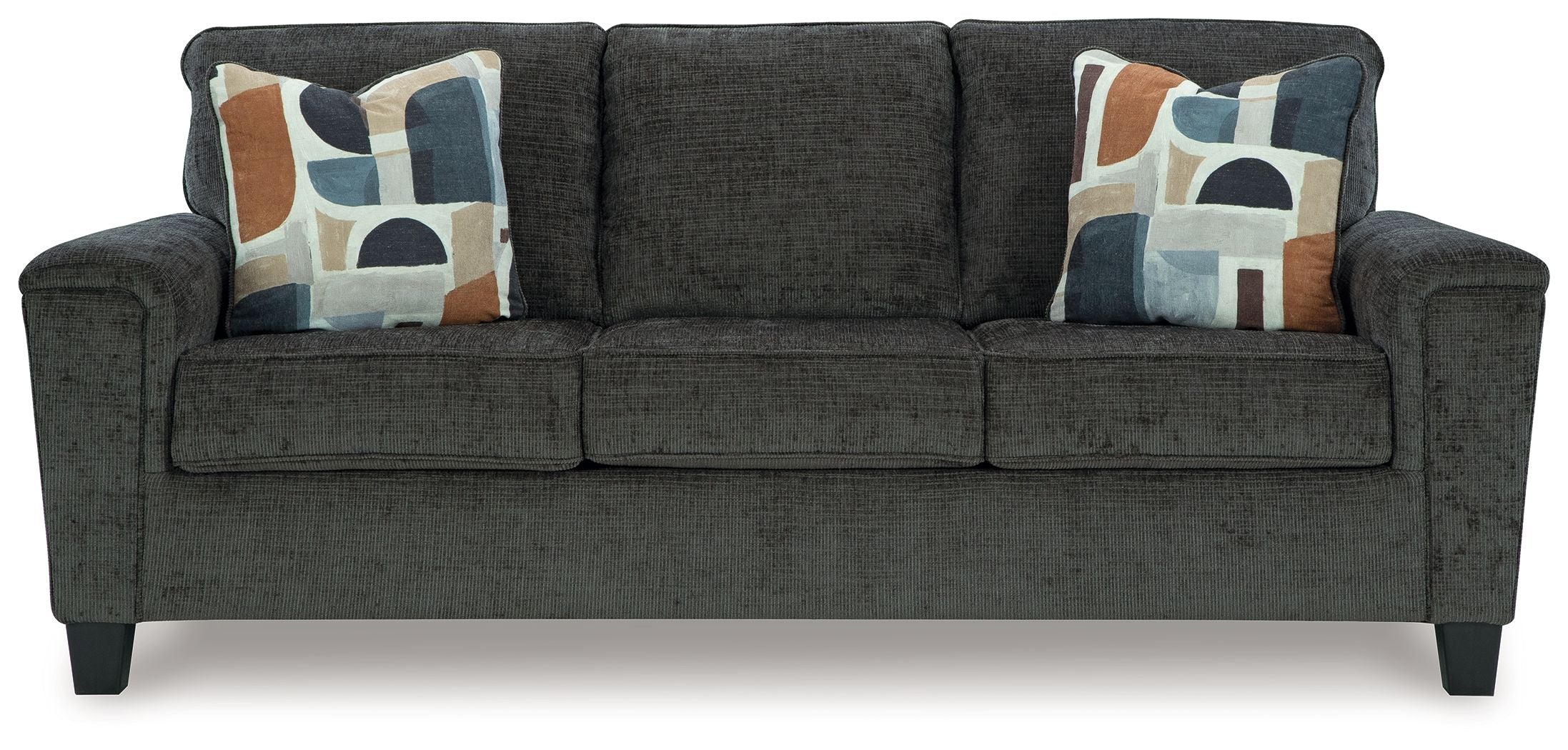 Dark gray sofa with three seat cushions and patterned throw pillows