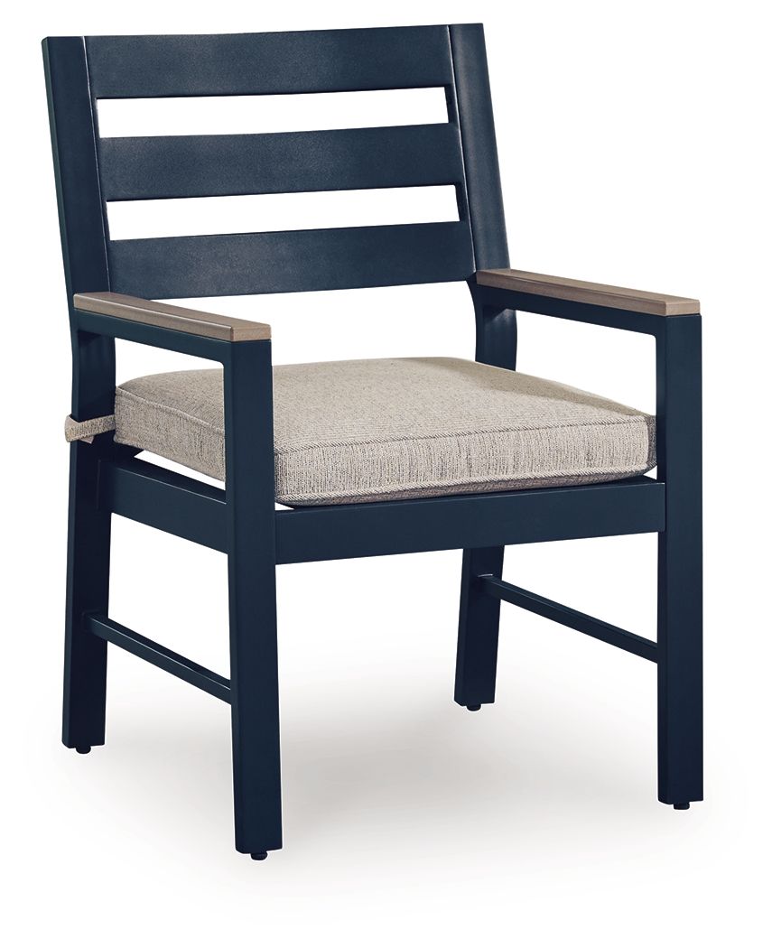 Blue arm chair with beige cushion and slatted back