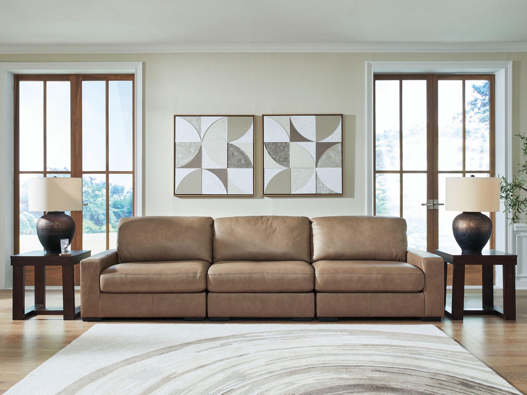 Three-seat sectional sofa with corner chaise in taupe fabric and boxed back cushions