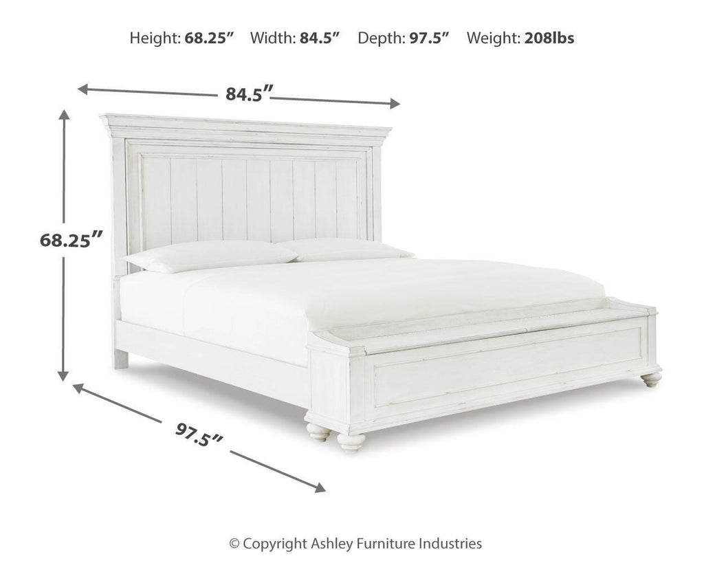 Kanwyn panel bed in white, wide paneled headboard and low slat platform with legs