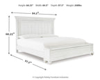 Kanwyn panel bed in white, wide paneled headboard and low slat platform with legs
