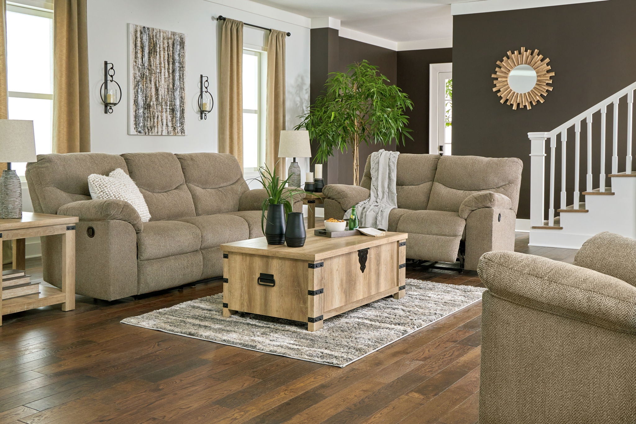 Upholstered sofa, loveseat, and recliner set in neutral fabric, rounded armrests