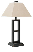 Black metal table lamp with tan fabric shade and rectangular glass window panels