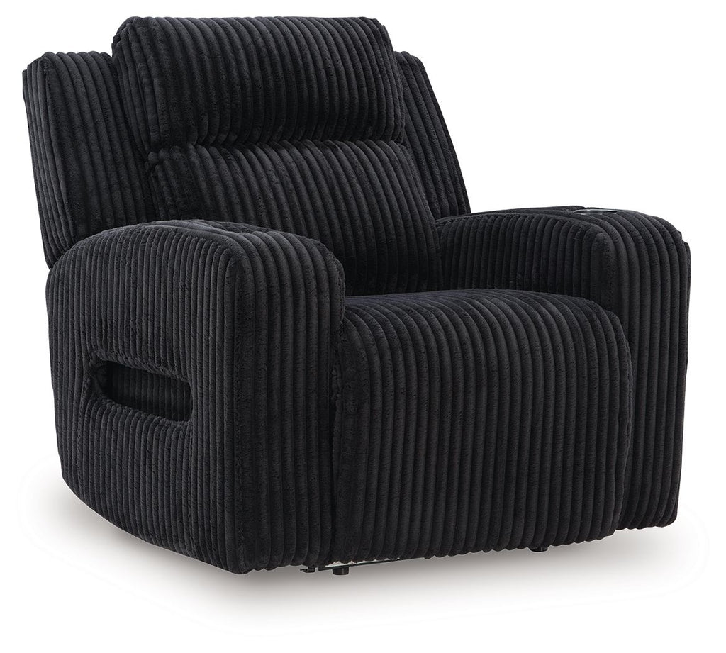 Black corduroy recliner with adjustable headrest and padded armrests