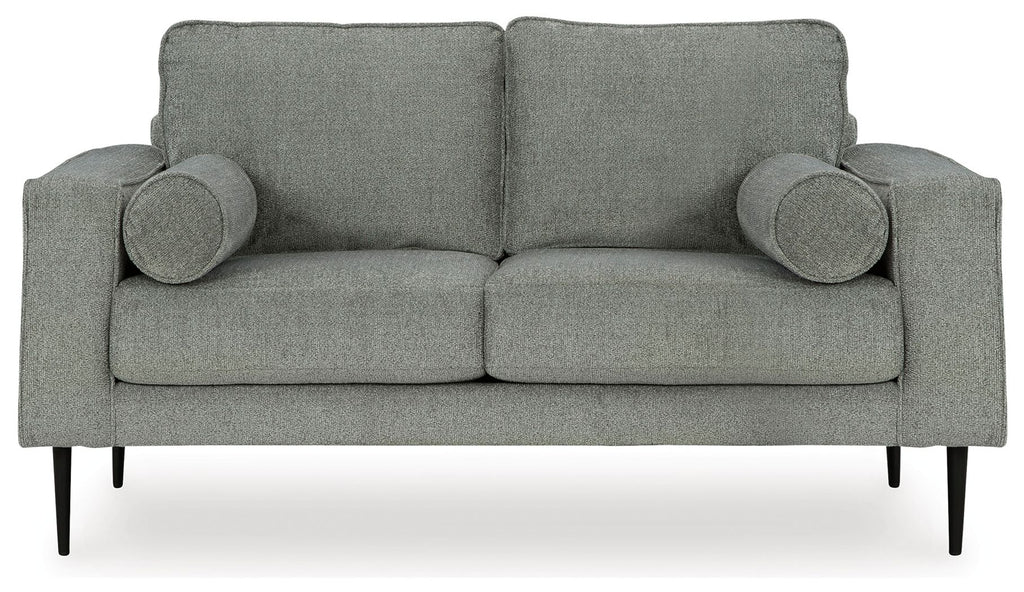 Charcoal loveseat with rolled arms and two round accent pillows, straight backrest