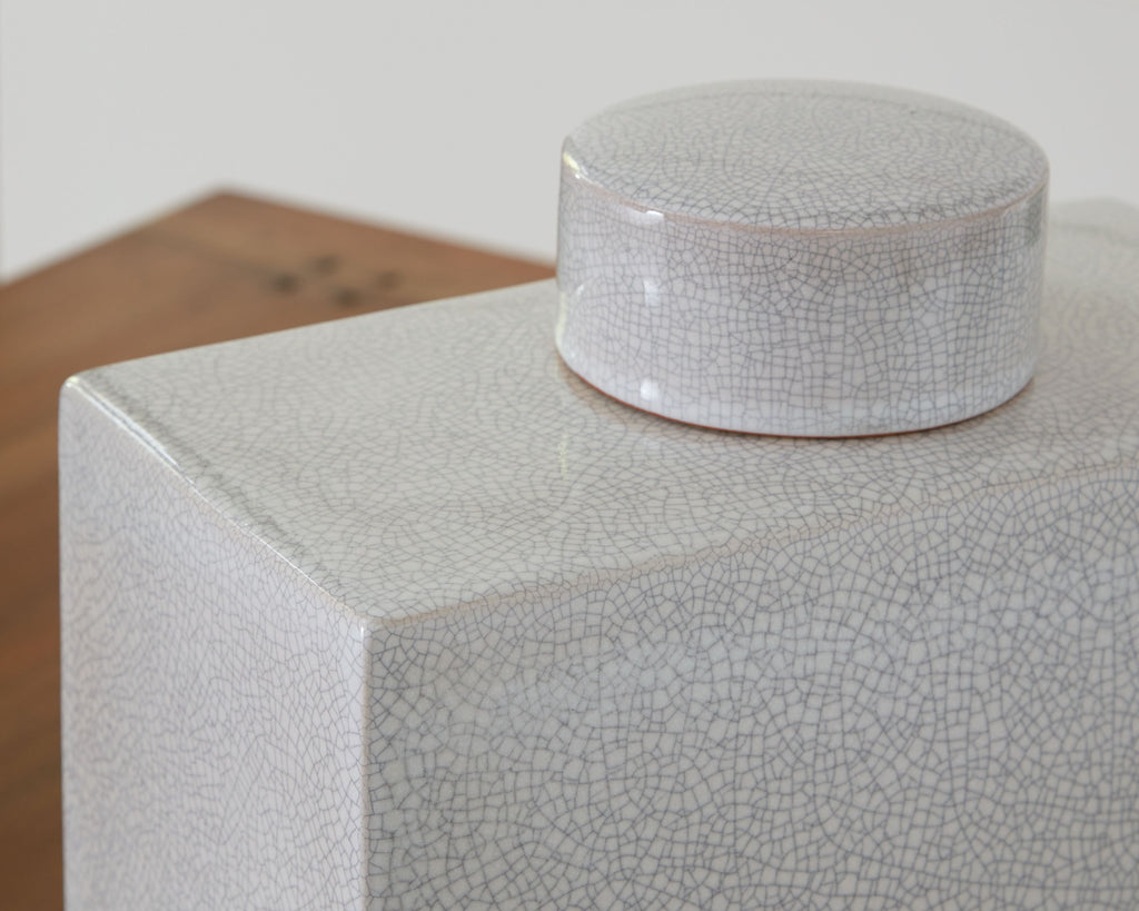 Haddworth jar corner detail with white crackle ceramic texture and round lid