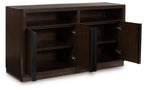Dark brown dining room server with two open side compartments and interior shelves
