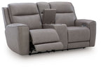 Dark gray power reclining loveseat with console and adjustable headrest, armrests