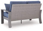 Blue loveseat with gray woven back panel, padded seat cushion and armrests