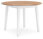 Round drop-leaf dining table with light brown top and white legs