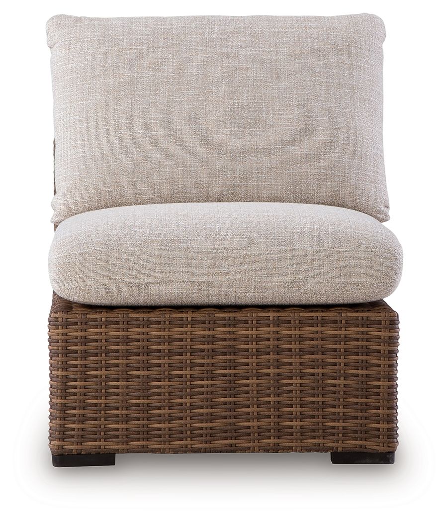 Beige armless chair cushion with dark brown woven wicker base