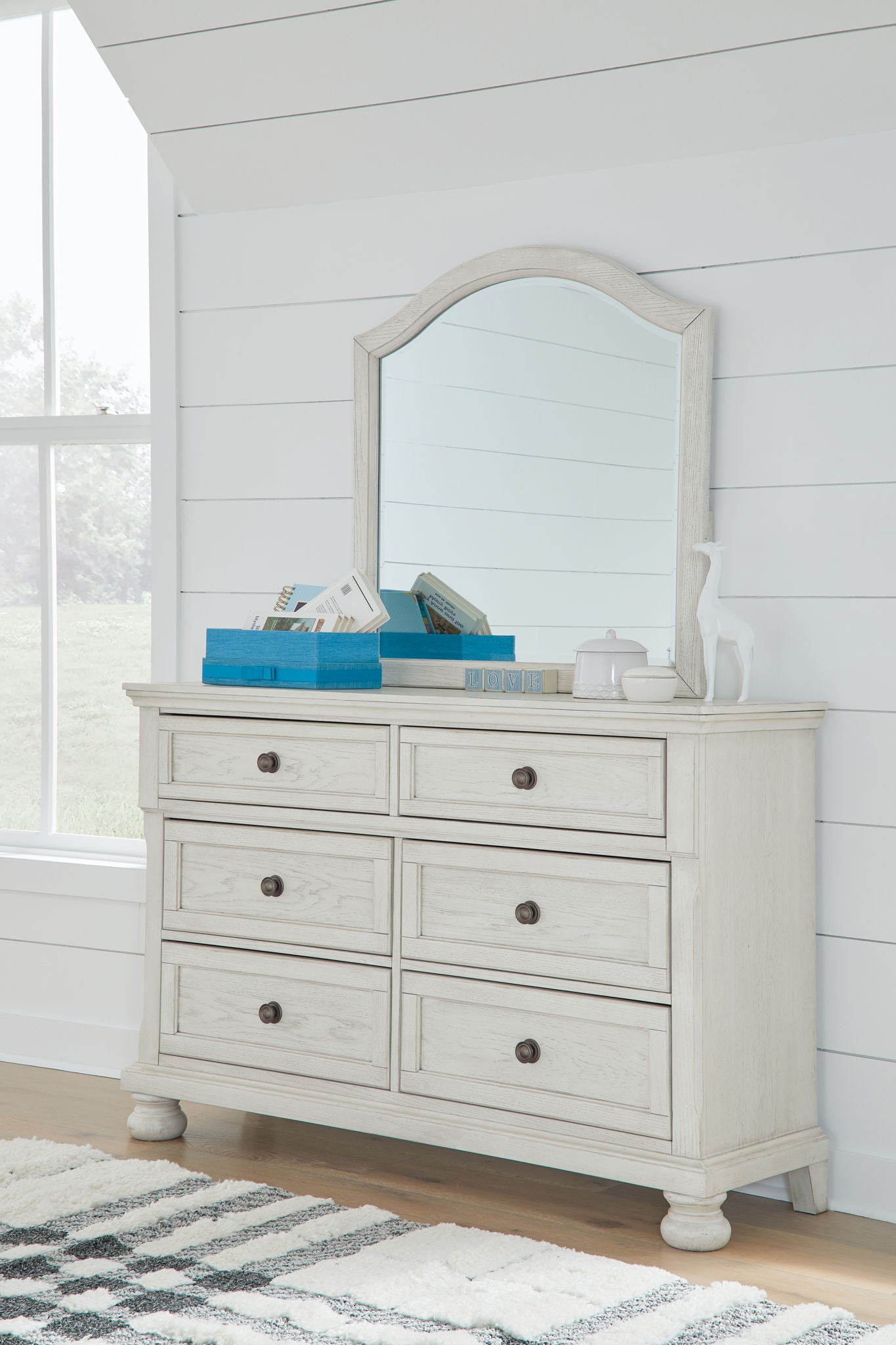 White youth sleigh dresser with large arched mirror and six drawers