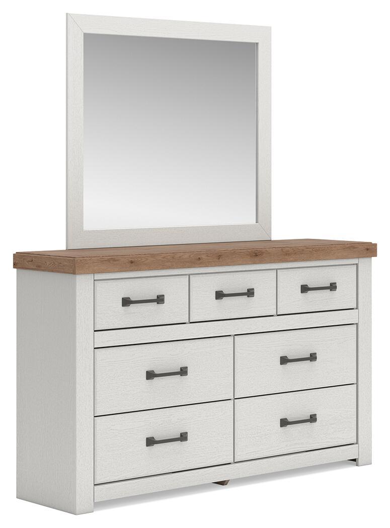 White dresser with wood top, six drawers, dark bar pulls, matching wall mirror