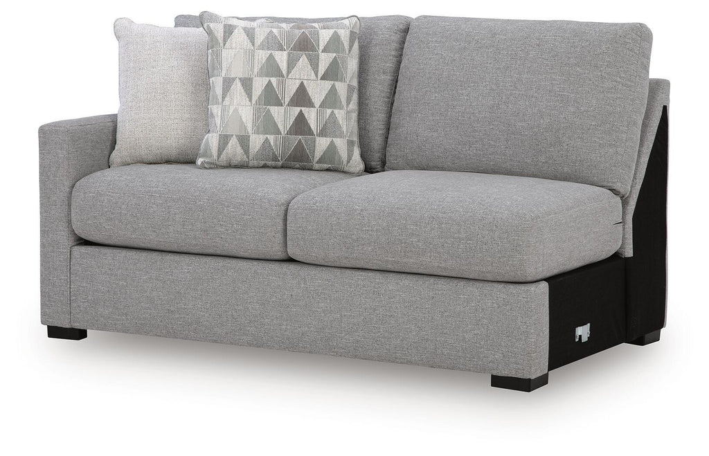 Pewter gray sofa with patterned lumbar pillow and beige accent cushion, squared arms