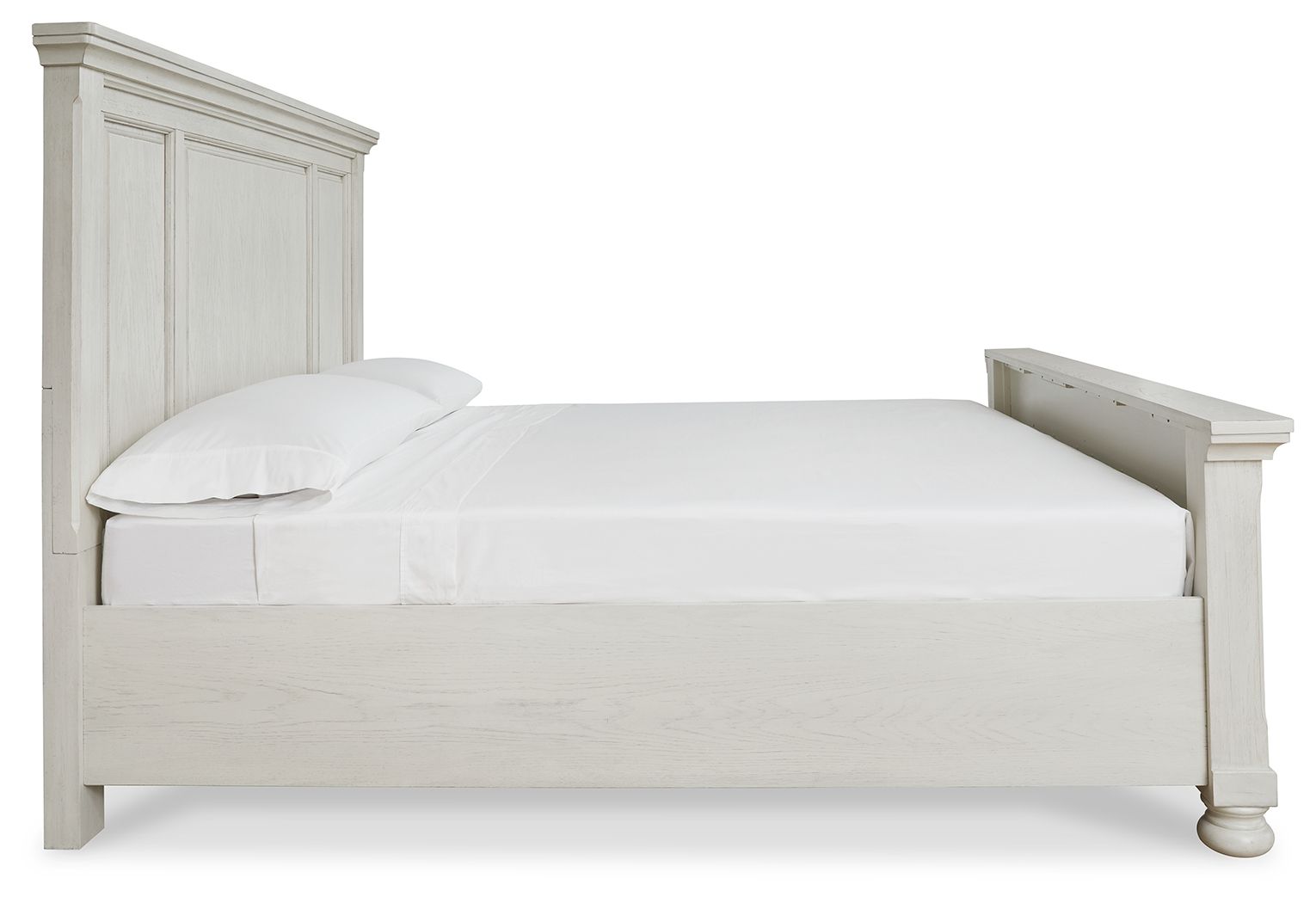 White panel bed frame with one pillow, low side rails and paneled headboard