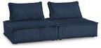 Navy modular sectional sofa with two back cushions and chaise seating