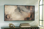 Framed abstract wall art on wall with brown, black, and gray smoky texture