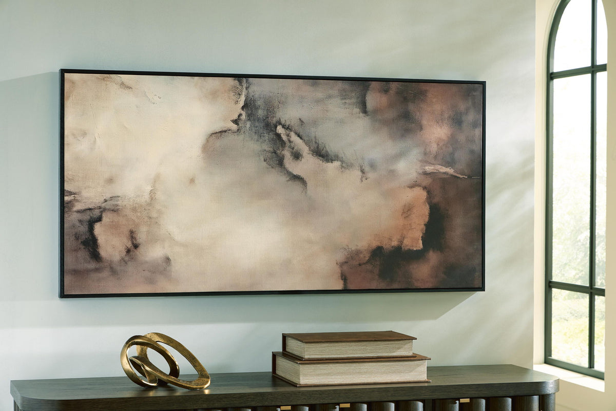 Framed abstract wall art on wall with brown, black, and gray smoky texture