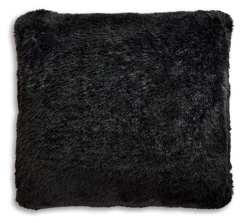 Black faux fur pillow, square close-up with plush shag texture.