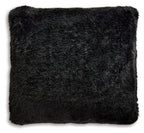 Black faux fur pillow, square close-up with plush shag texture.