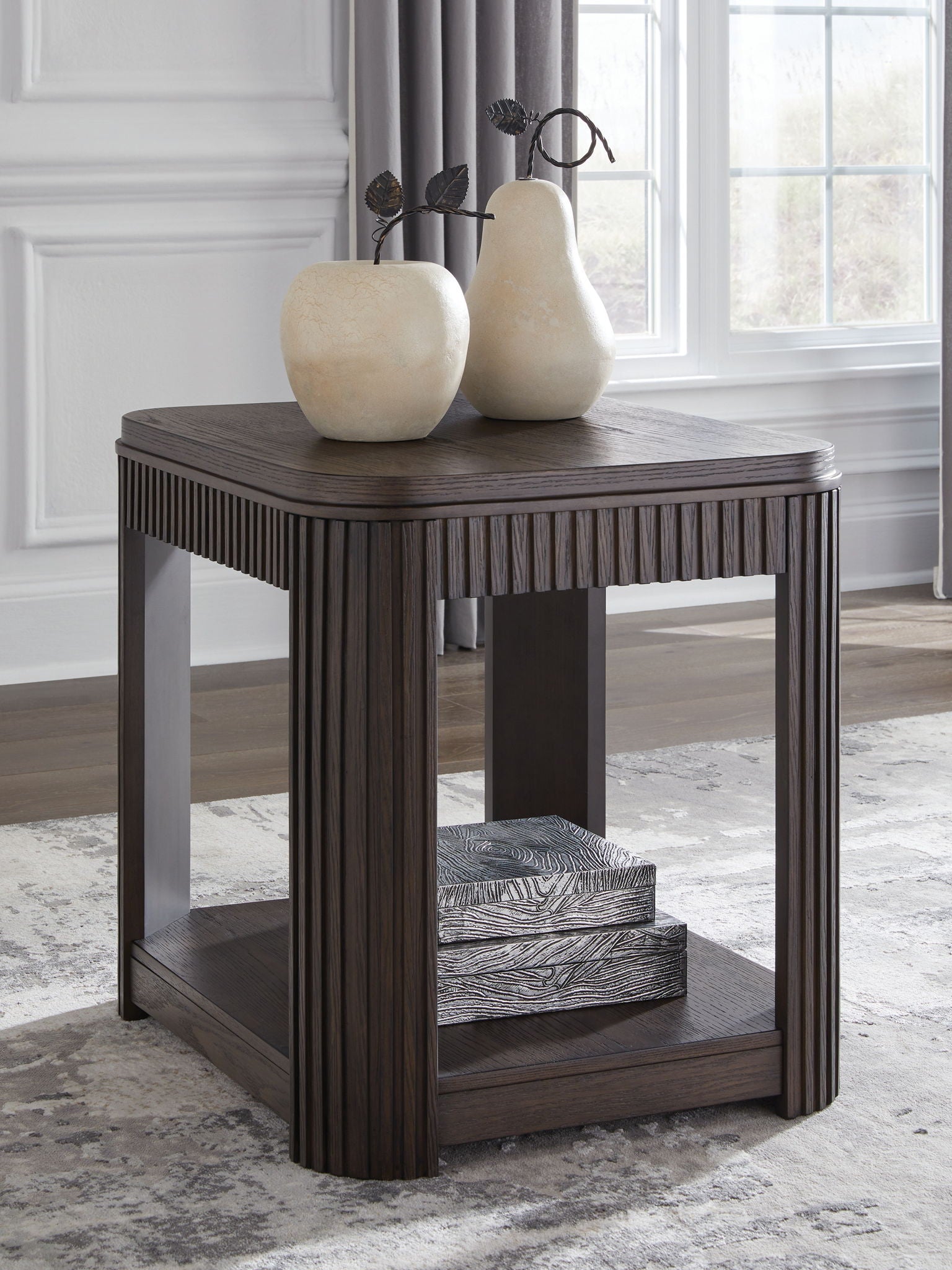 Dark brown rectangular side table with slatted sides and lower shelf, wood-look finish.