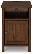Chair-side end table, warm brown wood grain, drawer and paneled cabinet door