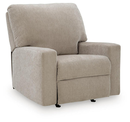 Light gray fabric rocker recliner chair with thick arms and a two-cushion seat.