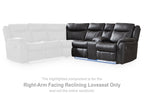Reclining loveseat with dark gray upholstery, padded back and armrests