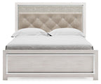 Queen bed with white side rails and tall light-gray tufted upholstered headboard