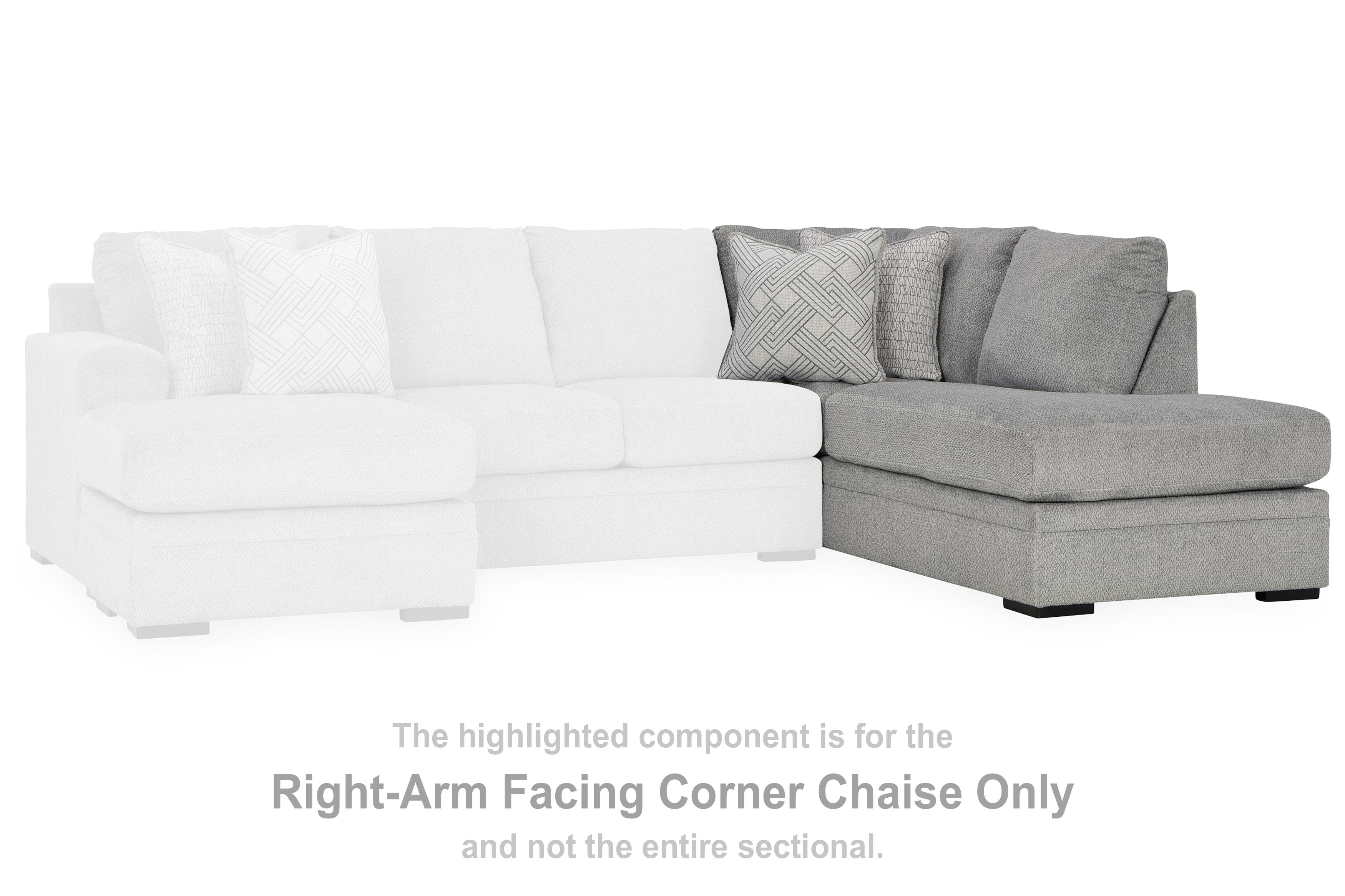 Right-arm facing corner chaise section in cement gray with patterned pillows