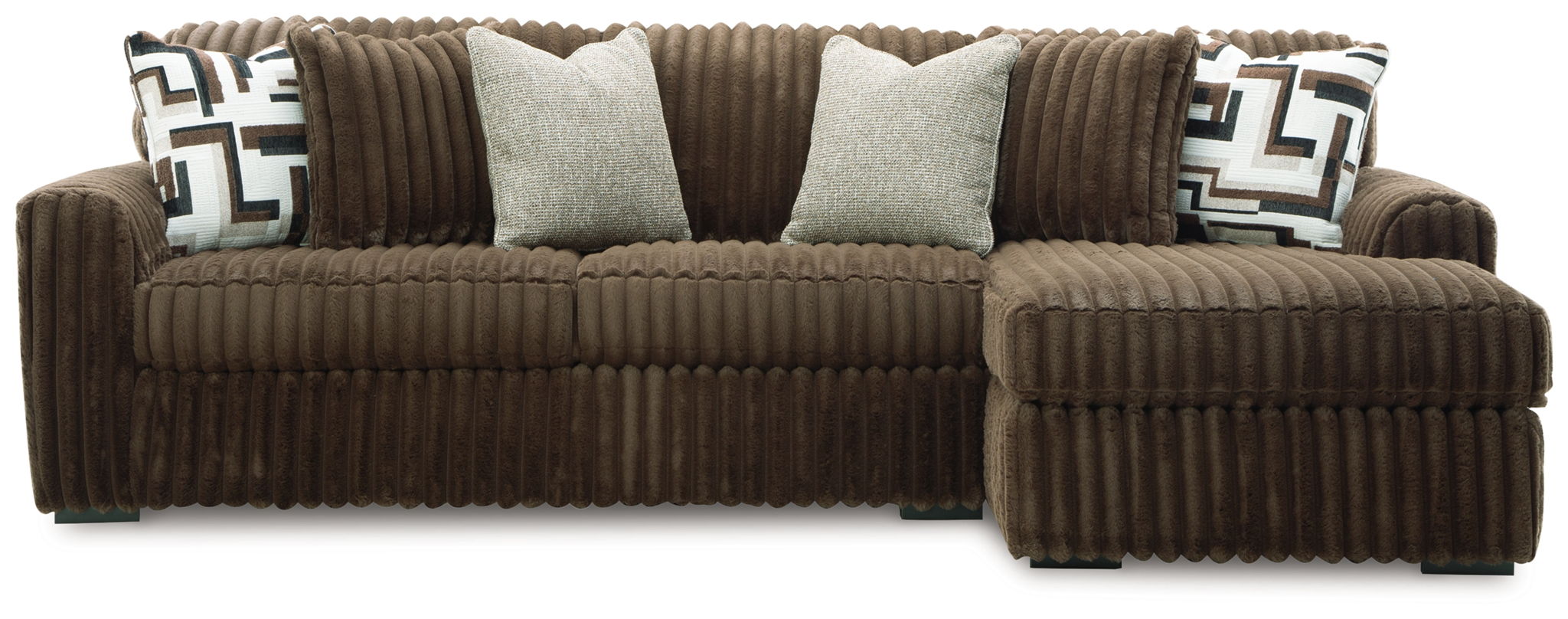 Brown corduroy sectional sofa with chaise corner and geometric accent pillows