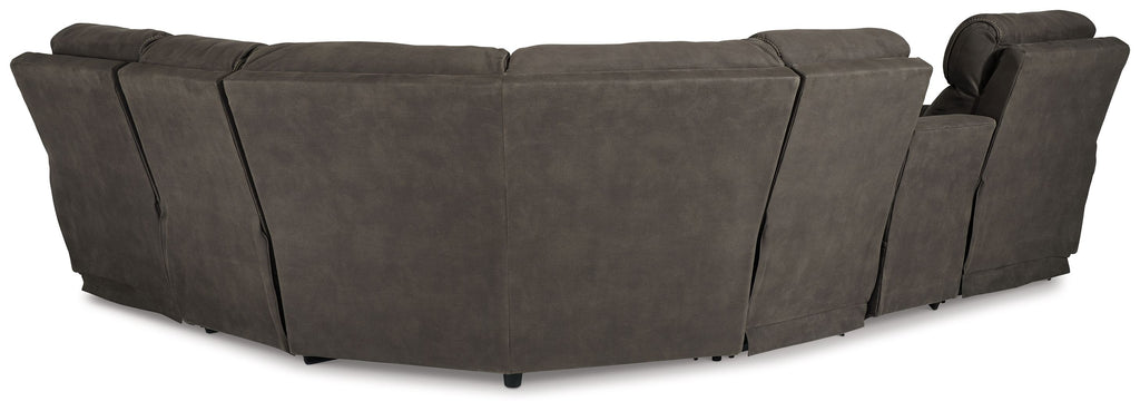 Dark gray L-shaped sectional sofa with high back cushions and console chaise