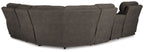 Gunmetal gray wedge sectional sofa section with seat cushions and tall back panels