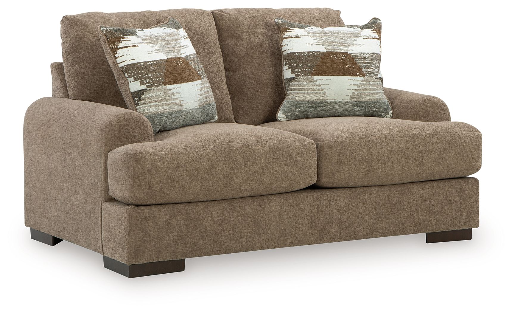 Taupe loveseat sofa with two seat cushions, square arms, dark legs, patterned accent pillows