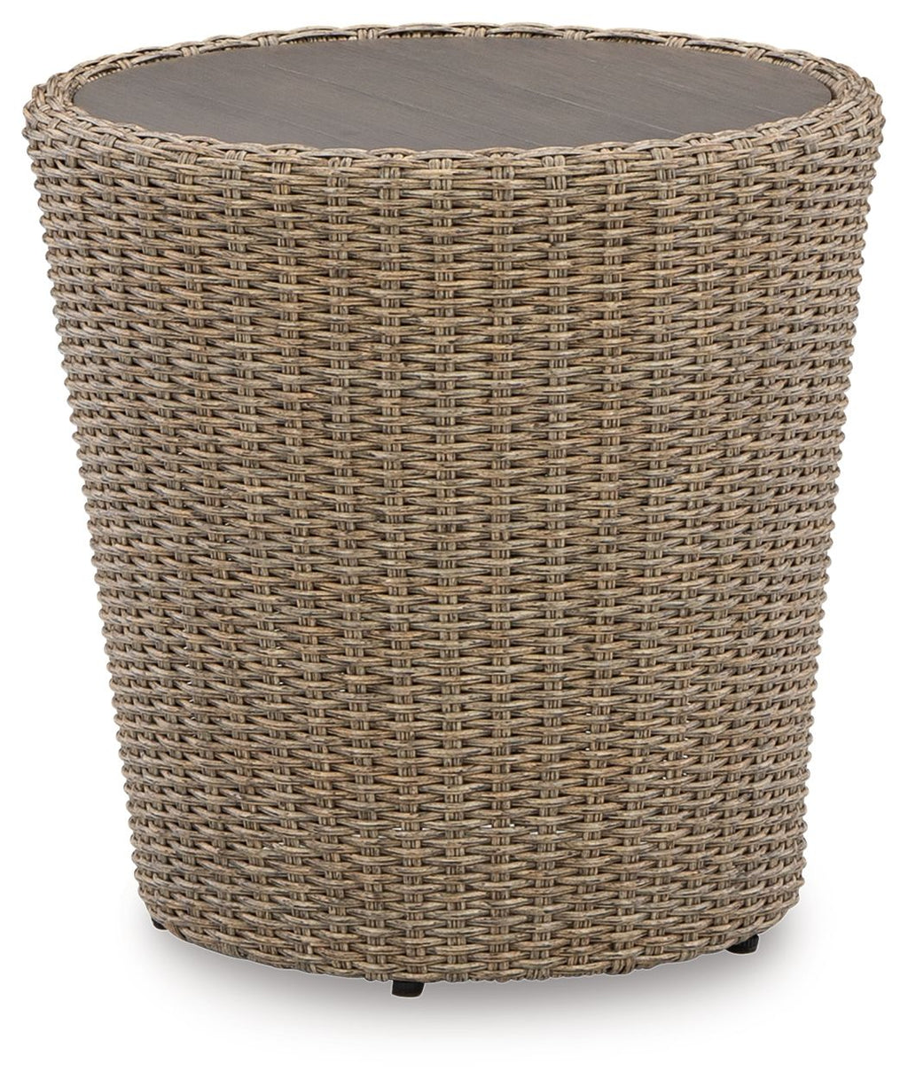 Beige round end table with woven wicker basket-style body and flat top.