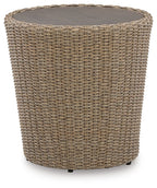 Beige round end table with woven wicker basket-style body and flat top.