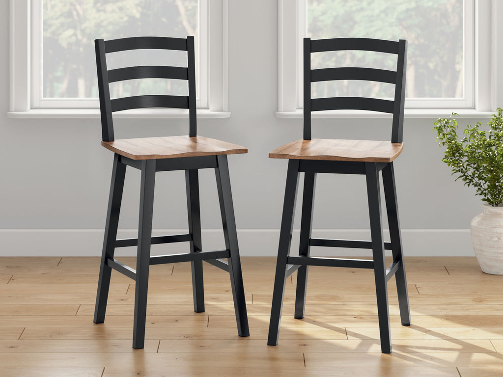 Set of two black swivel stools with slatted backs and wooden seats