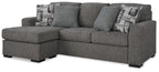 Pewter fabric sectional sofa chaise with left chaise, three back pillows and two patterned throws