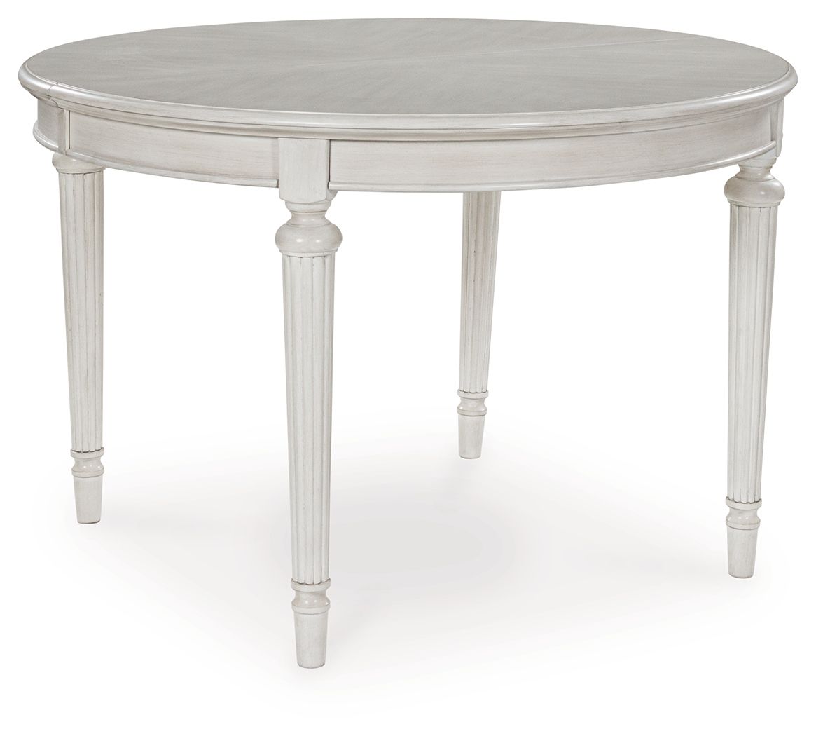 Antique white oval dining extension table with pedestal base and routed trim