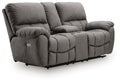 Dark gray power recline loveseat with padded adjustable headrests and console